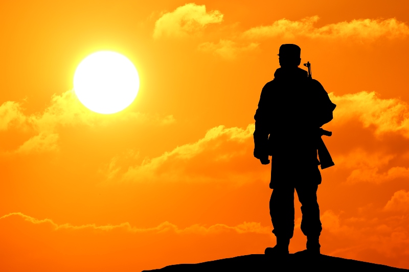 Silhouette Shot of Soldier Holding Gun | Geissele Super Duty Rifle Review