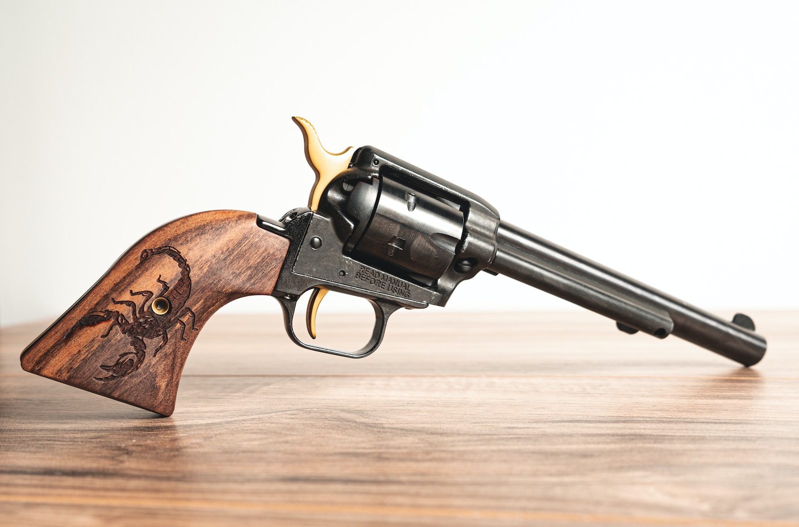 Lightweight 9mm Revolvers brown and silver revolver pistol