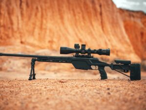 ruger precision rifle black rifle on brown sand