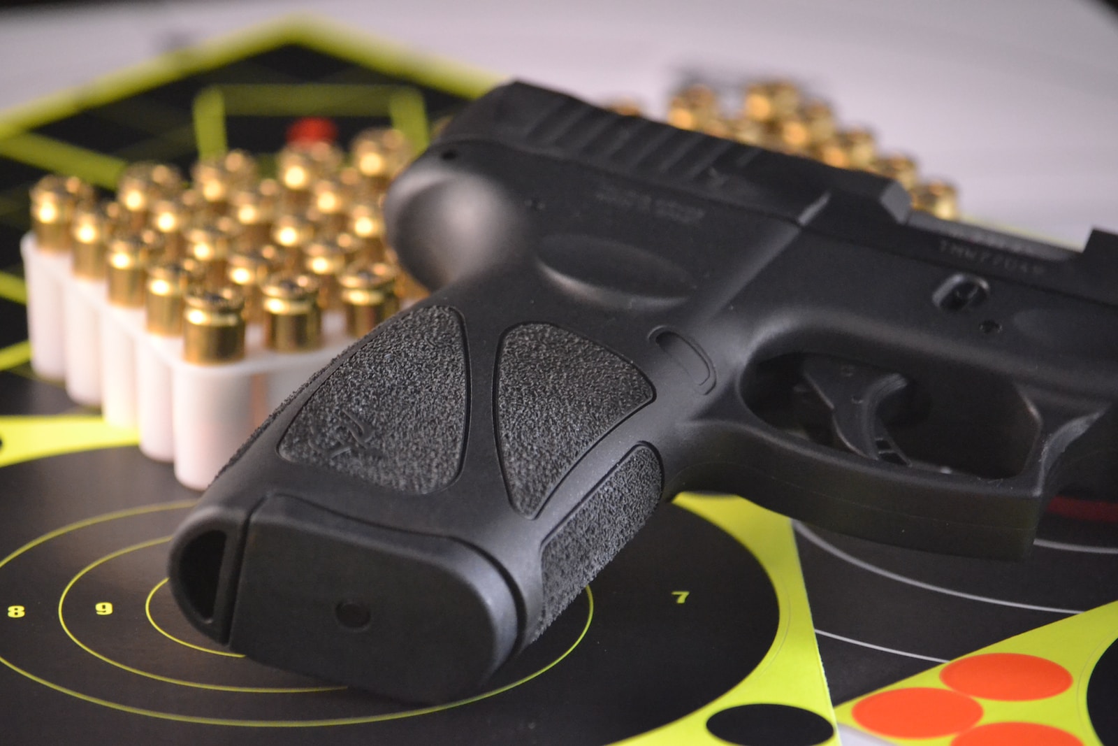  Taurus G3 black pistol beside bullets