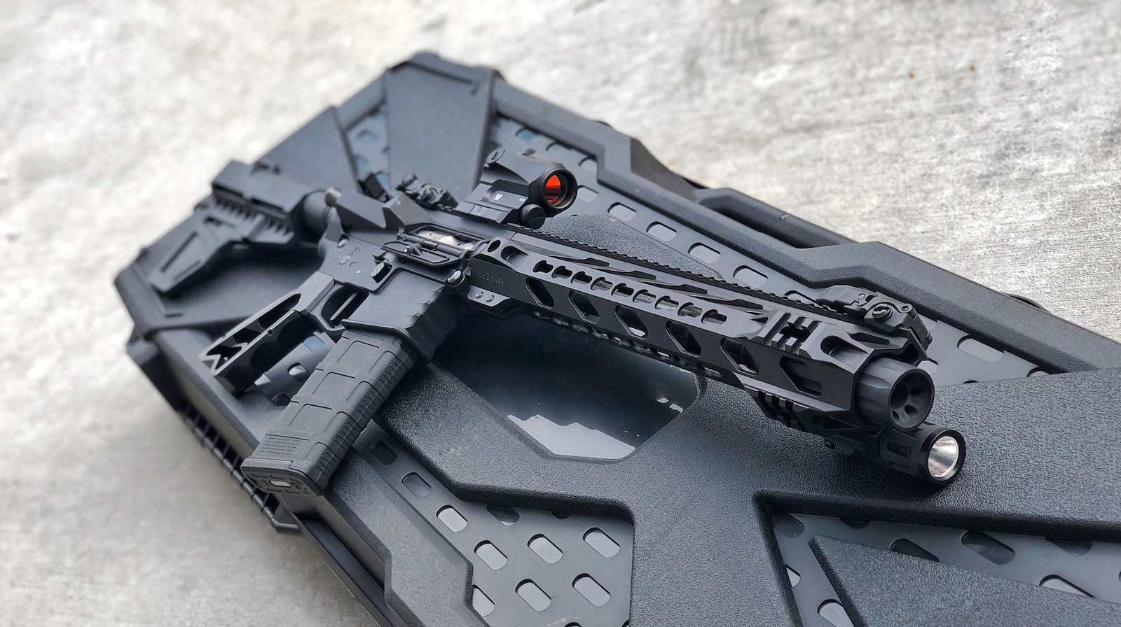 black rifle on black plastic case Handguard