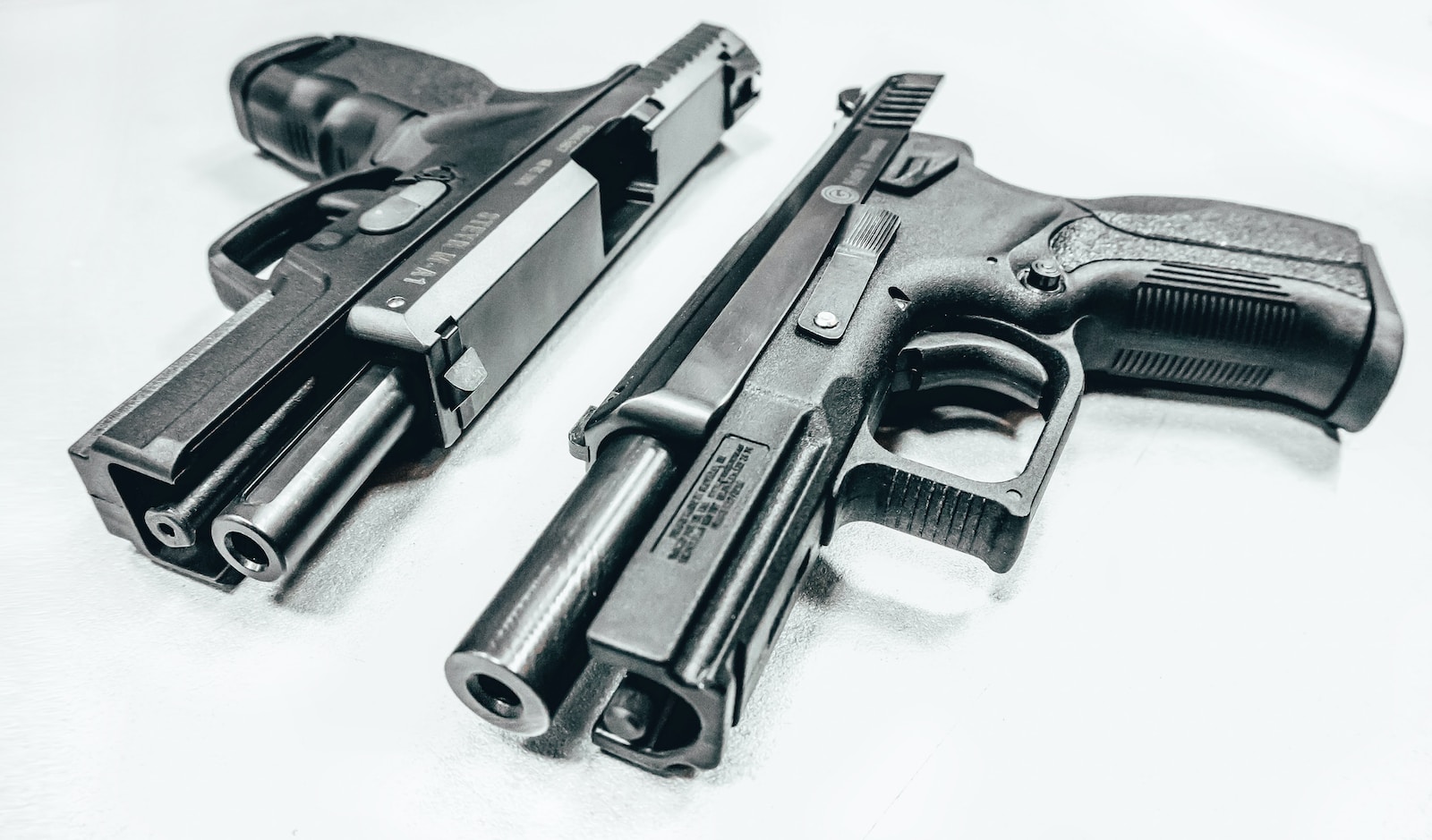 Smith & Wesson M&P Shield M2.0 Compact black semi automatic airsoft pistol on white textile