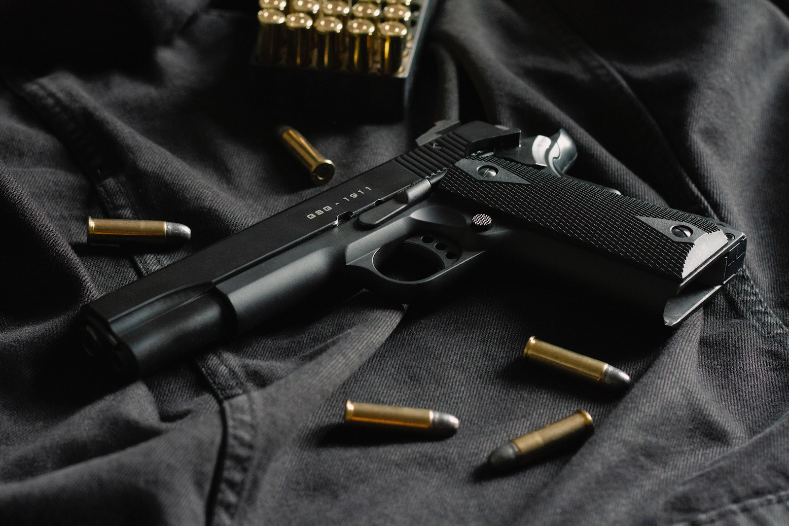 Taurus G3 black semi automatic pistol on black textile